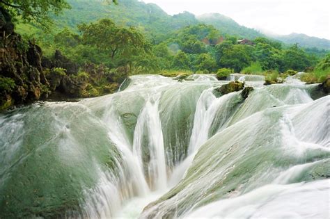  ¡La Reserva Natural de Huangguoshu: Un torbellino de agua y leyendas milenarias!